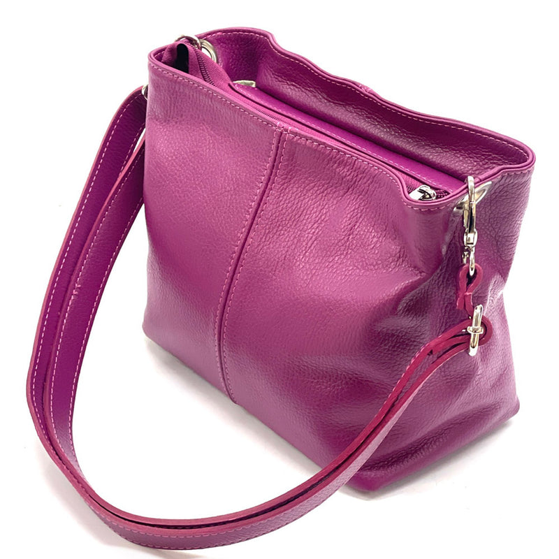 Angled view of Nina leather Handbag in fuchsia