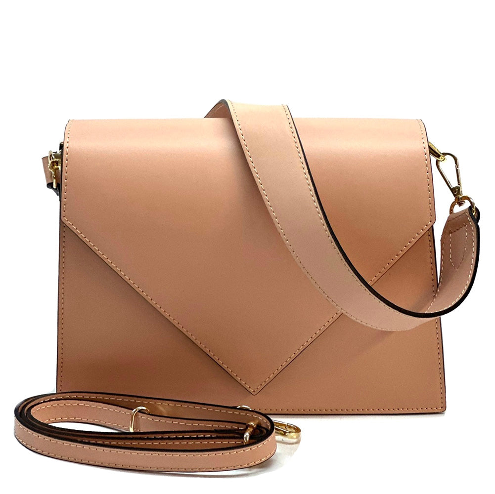 Beige handbag with a strap on a white background