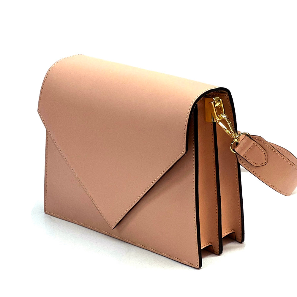 Beige handbag with a gold zipper on a white background
