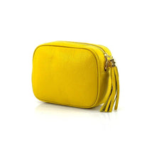 Angled view of Amara Yellow leather shoulder bag