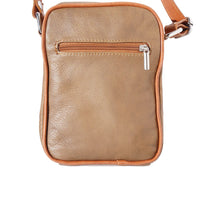 The bag closed, highlighting its sleek design and adjustable shoulder strap.