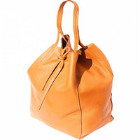 Tan leather shoulder bag - angled view