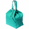 angled view of turquoise leather shoulder bag for women
