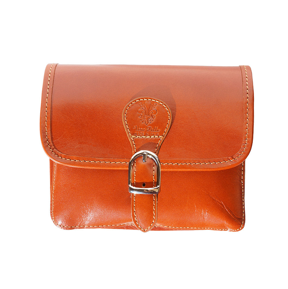 Yuri leather shoulder bag in tan color showing silver buckle and Italian leather logo