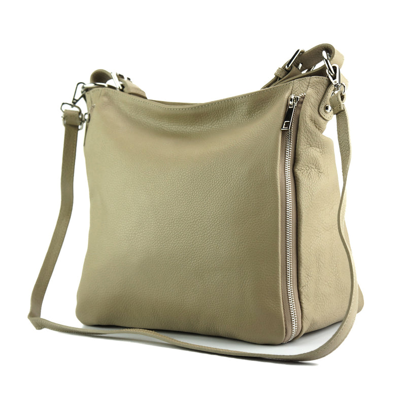 Artemisa Leather Hobo Bag in Light Taupe - angled view showing light taupe adjustable strap