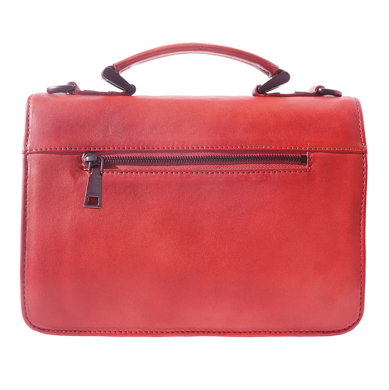 Red vintage leather briefcase showing zip closure