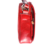 Small travel bag with shoulder strap in genuine cow leather-1