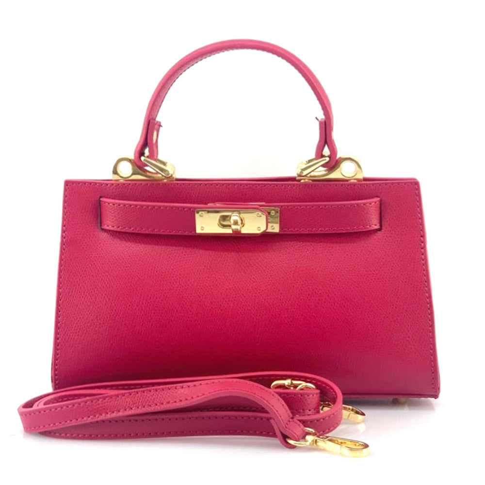Lightweight Luxury Leather Bag in Fuchsia - front view showing high quality gold fittings and handle