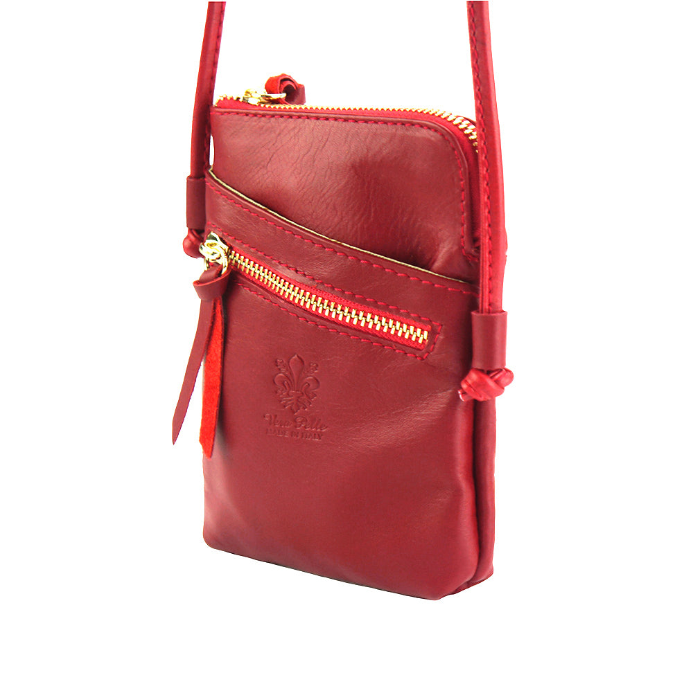 Angled view of Adriana Cross-body leather bag in red