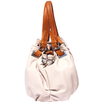 Side view of the Creme and Brown Valentina leather handbag