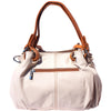 The Valentina Leather Sling Bag displayed in handbag mode, showcasing the double handles and interior.