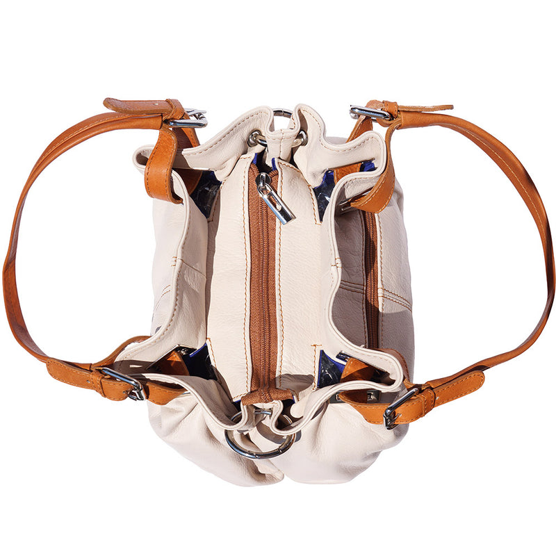 The bag displayed in crossbody mode, highlighting the adjustable shoulder strap.