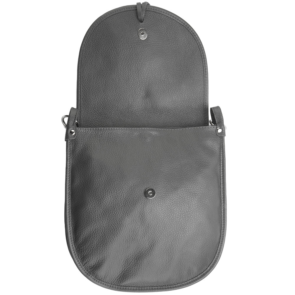 Interior view of the Elisa cross-body bag in grey showing button closure